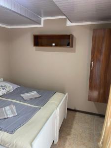 A bed or beds in a room at Vakho house
