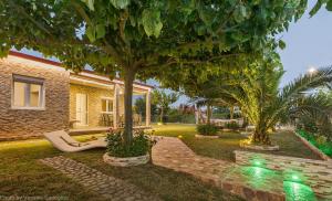 Zahrada ubytování Costa Petra - Luxury Seaside Cottage with Garden - Vacation House for families in Greece