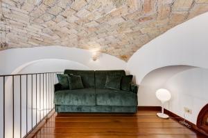 Area soggiorno di Casa Valentina - Oasi di tranquillità e stile a Testaccio