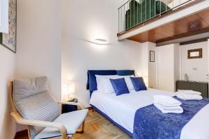 Letto o letti in una camera di Casa Valentina - Oasi di tranquillità e stile a Testaccio