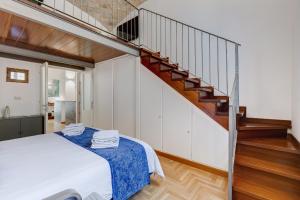 Letto o letti in una camera di Casa Valentina - Oasi di tranquillità e stile a Testaccio