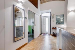 TV o dispositivi per l'intrattenimento presso Casa Valentina - Oasi di tranquillità e stile a Testaccio