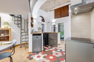 Cucina o angolo cottura di Casa Valentina - Oasi di tranquillità e stile a Testaccio