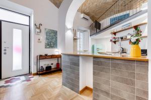 Cucina o angolo cottura di Casa Valentina - Oasi di tranquillità e stile a Testaccio