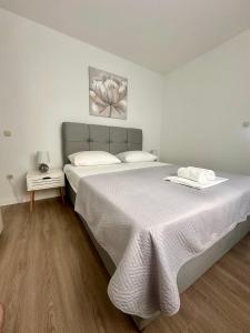 Postel nebo postele na pokoji v ubytování Seaside apartments Polić, Rogoznica