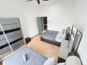 Ein Bett oder Betten in einem Zimmer der Unterkunft Next to Paradigm Mall Escape JB,3BR, Up to 10 Person,