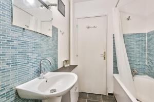 Koupelna v ubytování Confort et Calme Appart 2 personnes