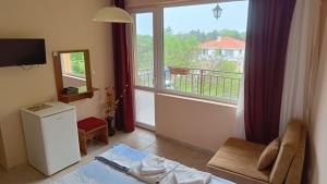Ein Balkon oder eine Terrasse in der Unterkunft Вила Фернандес