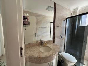 Ένα μπάνιο στο Apê Guarujá Praia das Pitangueiras +6 φωτογραφίες