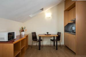 Nhà bếp/bếp nhỏ tại iH Hotels Milano ApartHotel Argonne Park