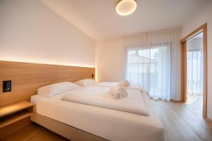 Postel nebo postele na pokoji v ubytování 735 Apartment Julia I Villa Ehrenburg