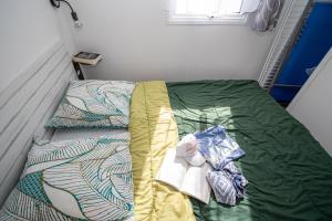 Llit o llits en una habitació de Vacances Vendée face à l'Océan