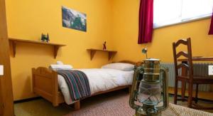 Rúm í herbergi á Hotel l'escale
