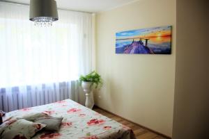 Ένα ή περισσότερα κρεβάτια σε δωμάτιο στο Jannseni 25 Apartment