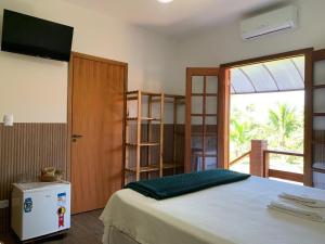 Pousada Estância Travessia客房内的一张或多张床位