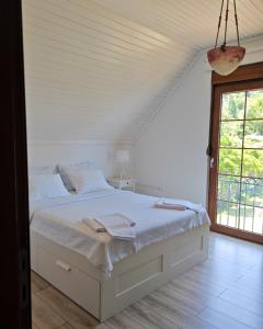 Postel nebo postele na pokoji v ubytování Kybele Resort + 11 fotografií