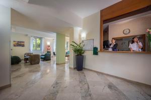 TV/trung tâm giải trí tại iH Hotels Milano ApartHotel Argonne Park