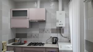 Köök või kööginurk majutusasutuses Apartment LUX 95 kvartal