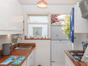 Kuchyň nebo kuchyňský kout v ubytování Kenny Cottage