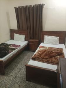 Postel nebo postele na pokoji v ubytování Galaxy Villa