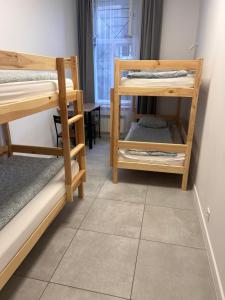 Postel nebo postele na pokoji v ubytování Golden Hostel