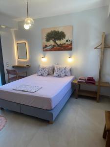 Posteľ alebo postele v izbe v ubytovaní Eressian Lodgings - Skala Eressos
