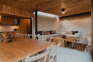 a living room with a table and a couch at el Riad de l'Empordà in Capmany