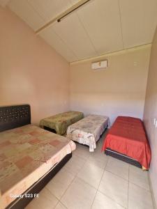 Postel nebo postele na pokoji v ubytování Rancho Lopes lago corumba 4 + 21 fotografií