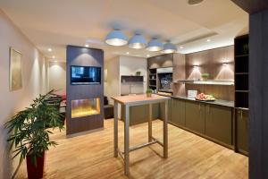 Kuchyň nebo kuchyňský kout v ubytování City Hotel Biel Bienne Free Parking