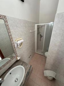 Koupelna v ubytování Hotel Colibri B&B + 34 fotografií