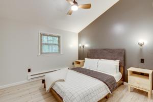 a bedroom with a bed and a ceiling fan at Lake Access at Family-Friendly Home in Tobyhanna in Tobyhanna +23 photos