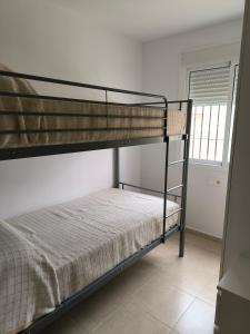 Posteľ alebo postele v izbe v ubytovaní Apartamentos Montedunas
