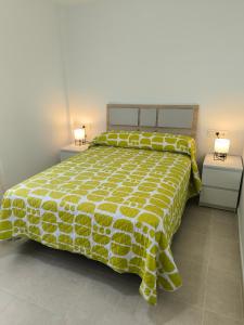 Posteľ alebo postele v izbe v ubytovaní Apartamentos Montedunas