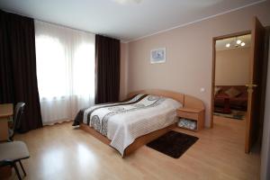 Postel nebo postele na pokoji v ubytování Hotel Jerevan