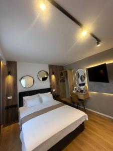 Postel nebo postele na pokoji v ubytování Hotel Sinan Han