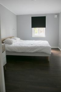 Postel nebo postele na pokoji v ubytování Pärnu Lubja Apartments