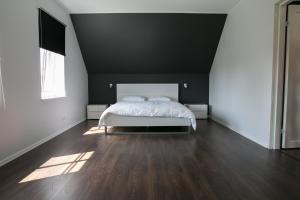 Postel nebo postele na pokoji v ubytování Pärnu Lubja Apartments