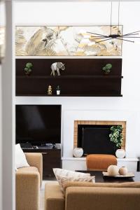 A television and/or entertainment centre at Villa Elesia