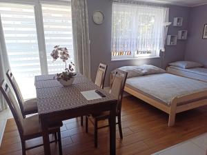 Posteľ alebo postele v izbe v ubytovaní Dobra Nocka