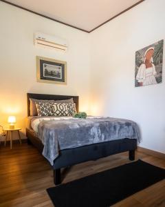 Postel nebo postele na pokoji v ubytování BUDDA HOME