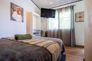 Postel nebo postele na pokoji v ubytování BUDDA HOME