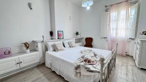 Katil atau katil-katil dalam bilik di Olbia Center, Modern House with AC and Wi-Fi