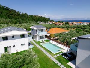 an aerial view of a house with a swimming pool at Emerald Project in Limenas