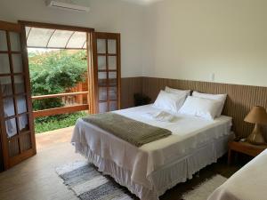 Pousada Estância Travessia客房内的一张或多张床位