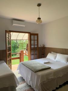 Pousada Estância Travessia客房内的一张或多张床位