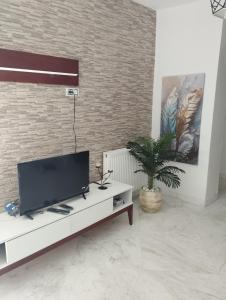 TV a/nebo společenská místnost v ubytování Résidence soltana Bizerte Vue sur mer