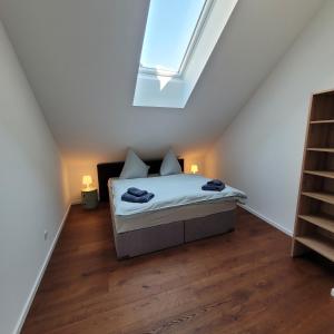 Postel nebo postele na pokoji v ubytování Scheune Am alten Posthof Lieser