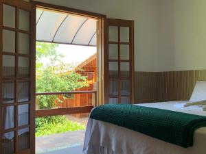Pousada Estância Travessia客房内的一张或多张床位
