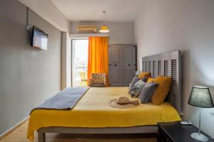 Postel nebo postele na pokoji v ubytování Eleana Apartments