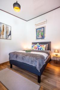 Postel nebo postele na pokoji v ubytování BUDDA HOME